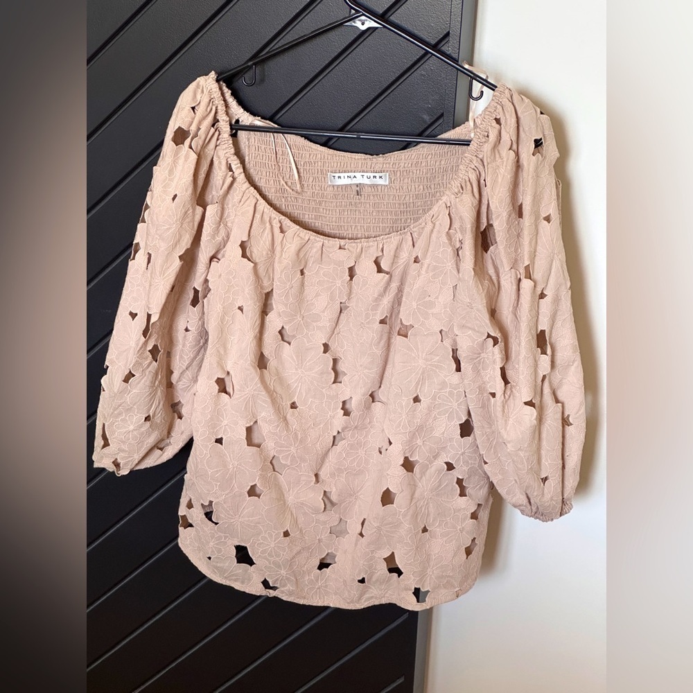 Trina Truck lace top. Size Small. Lace cutwork floral design. Great condition